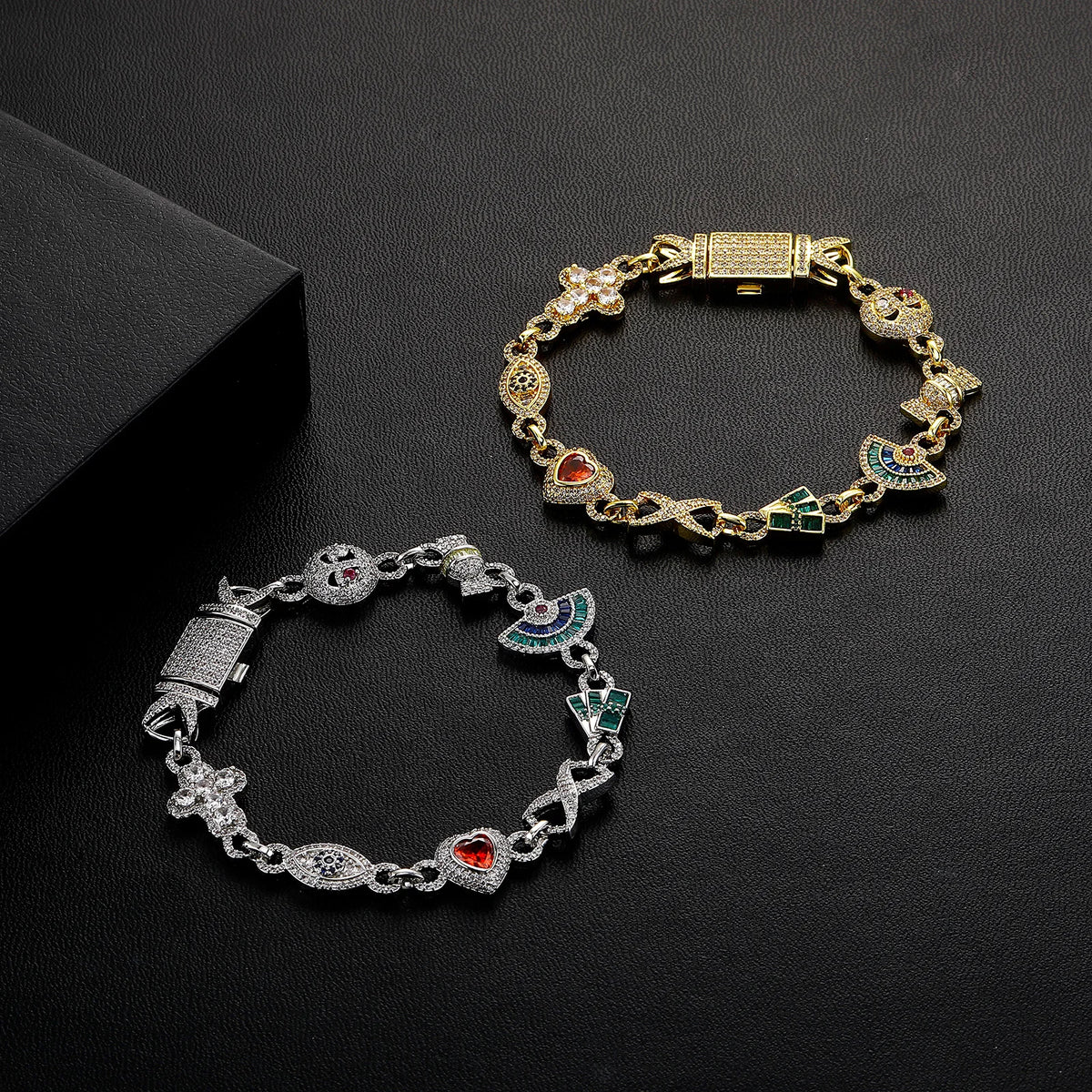 Lumière Charm Link Bracelet with floral, heart, eye and cross-inspired charm details