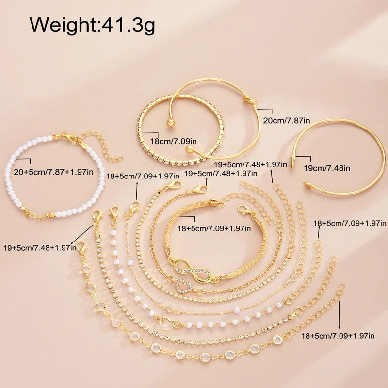 Amélie eleven-piece gold bracelet set on ivory display — detail 6