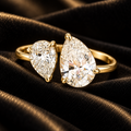 Ondine gold teardrop open ring luxury detail on black velvet