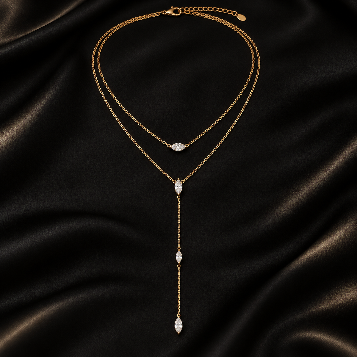 Éclat Marquise layered zircon Y-drop necklace on black satin