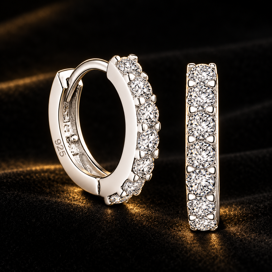 Lumière Cubic Zirconia Hoop Earrings on black velvet with gold lighting