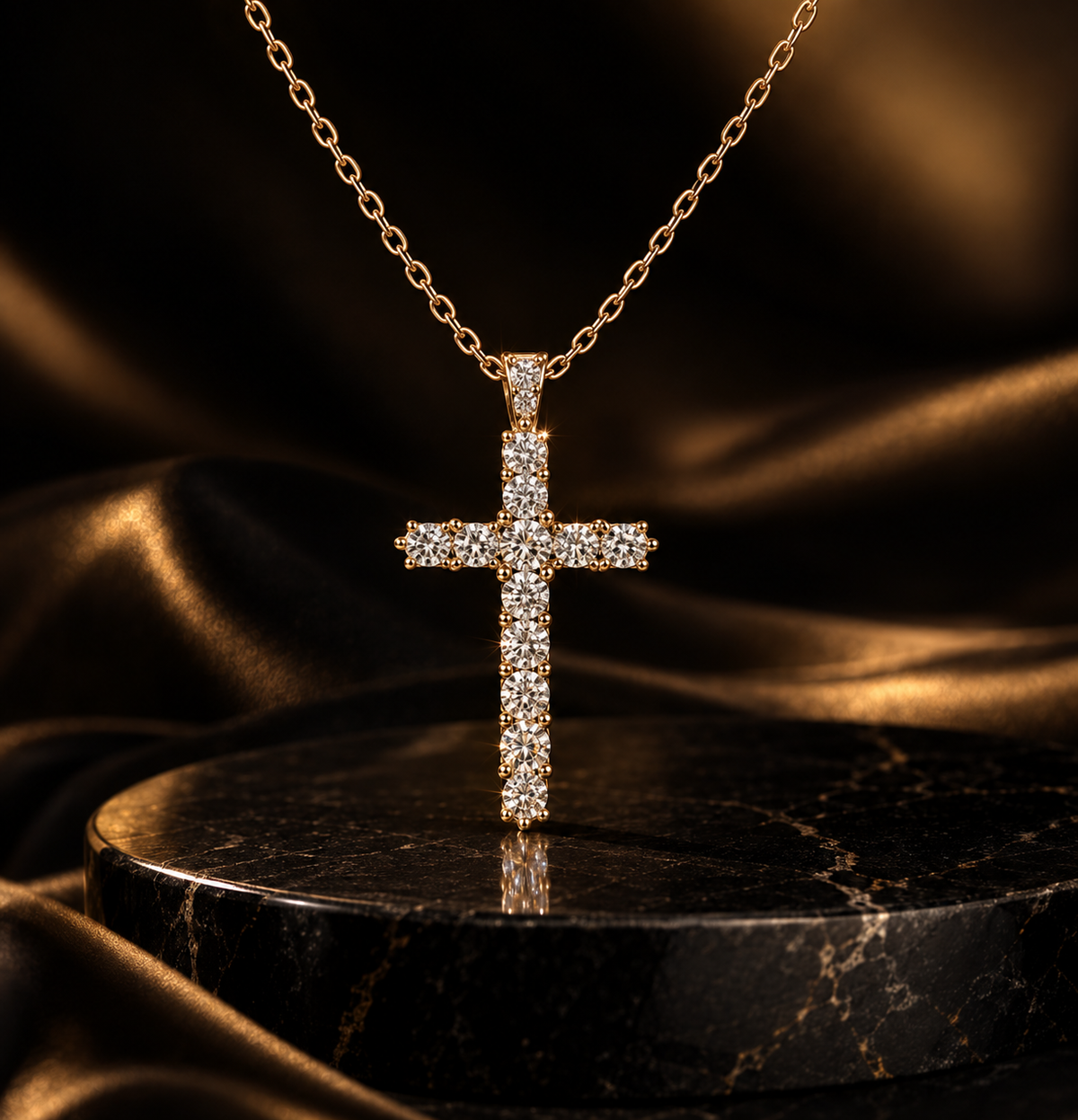 Lumière Croix Necklace on dark marble with warm gold lighting